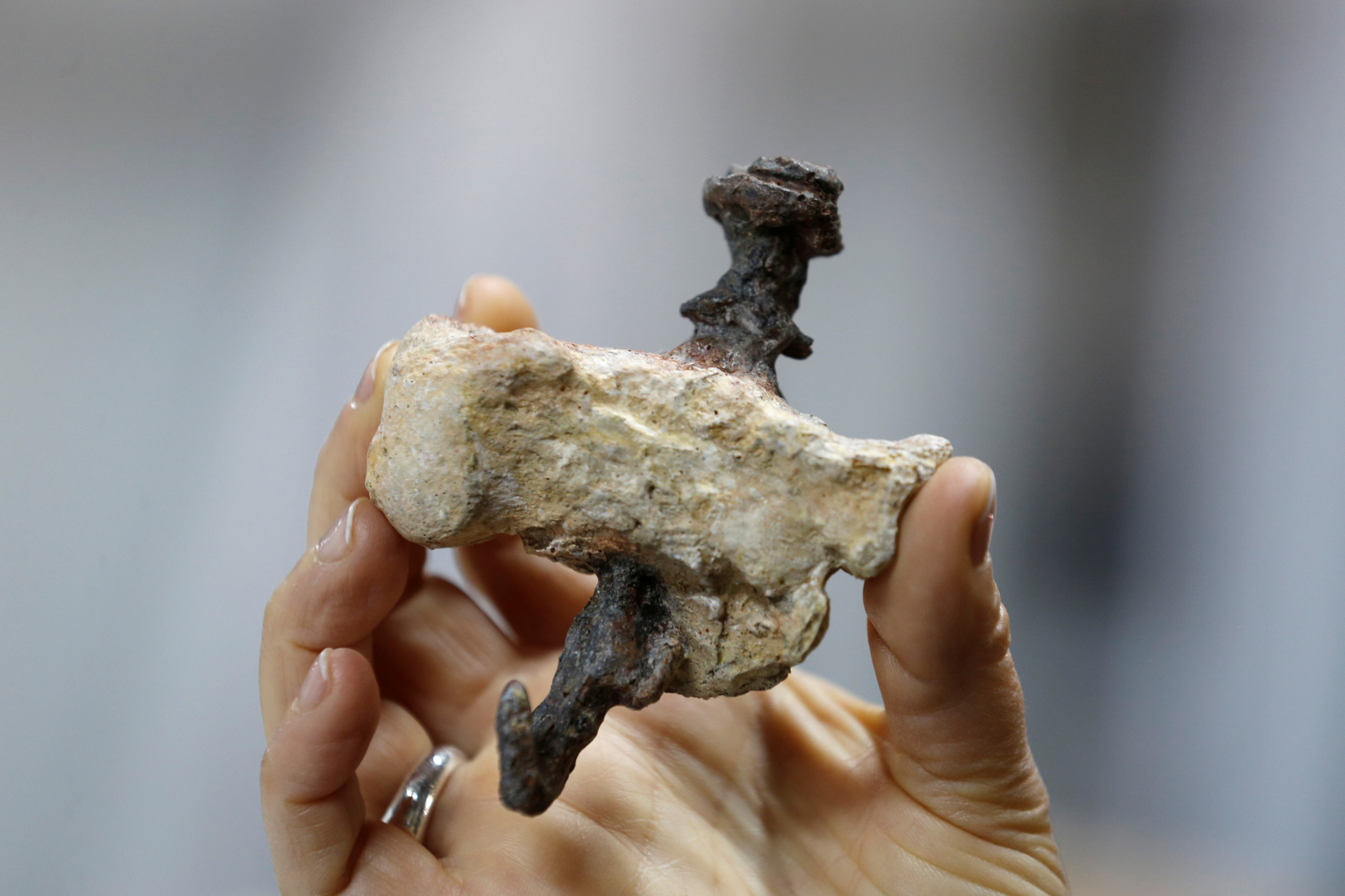 A replica of a find from Jerusalem, shows a heel bone pierced with an iron nail, believed to be the bone of Yehohanan Ben Hagkol, and provides evidence of execution by crucifixion during the time of Jesus, according to experts from Israeli Antiquities Authority and seen during a media tour presenting significant findings from that time, at Israel's National Treasures Storeroom, in Beit Shemesh, Israel March 19, 2017. REUTERS/Amir Cohen
